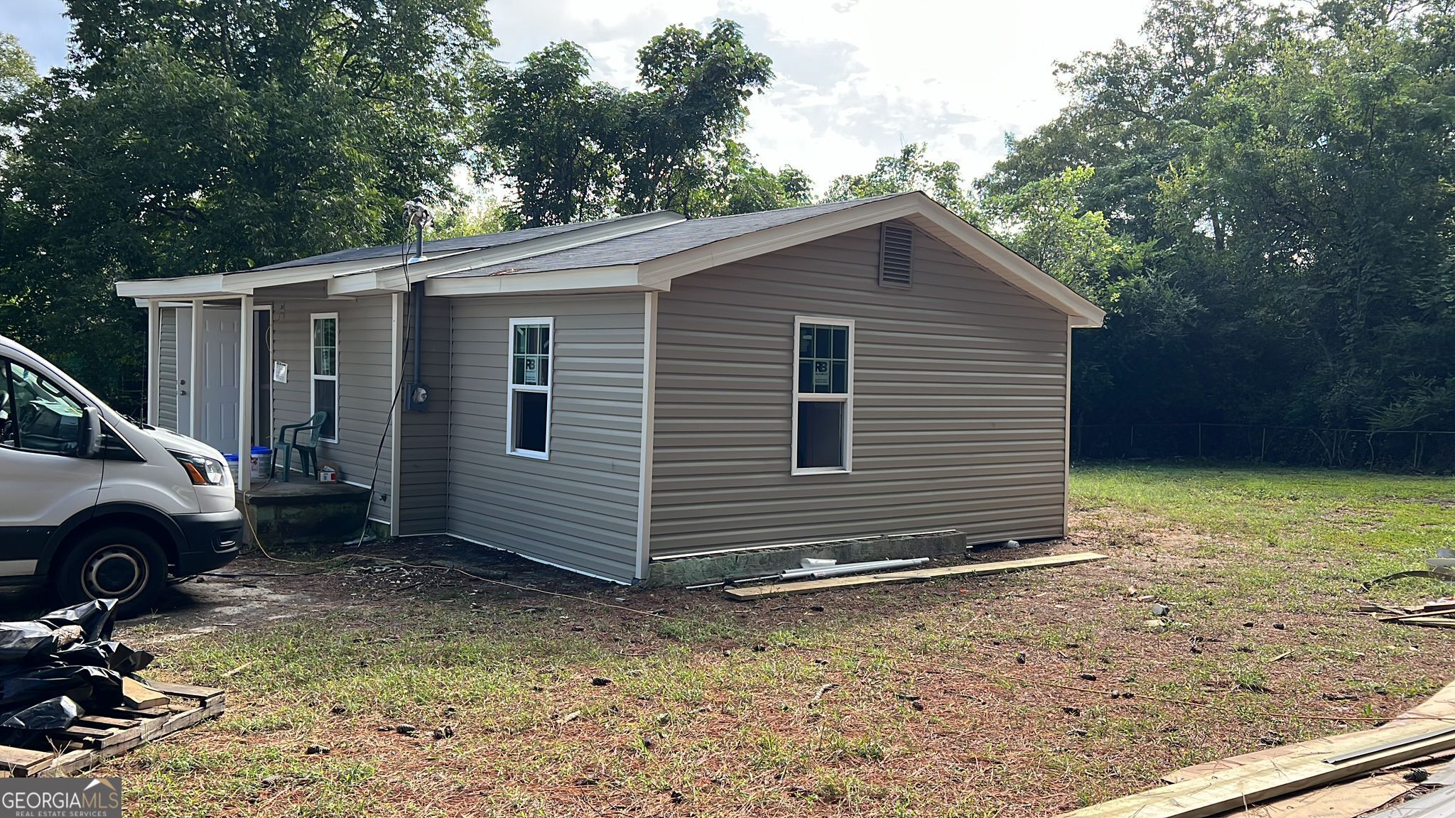 a view of backyard of house