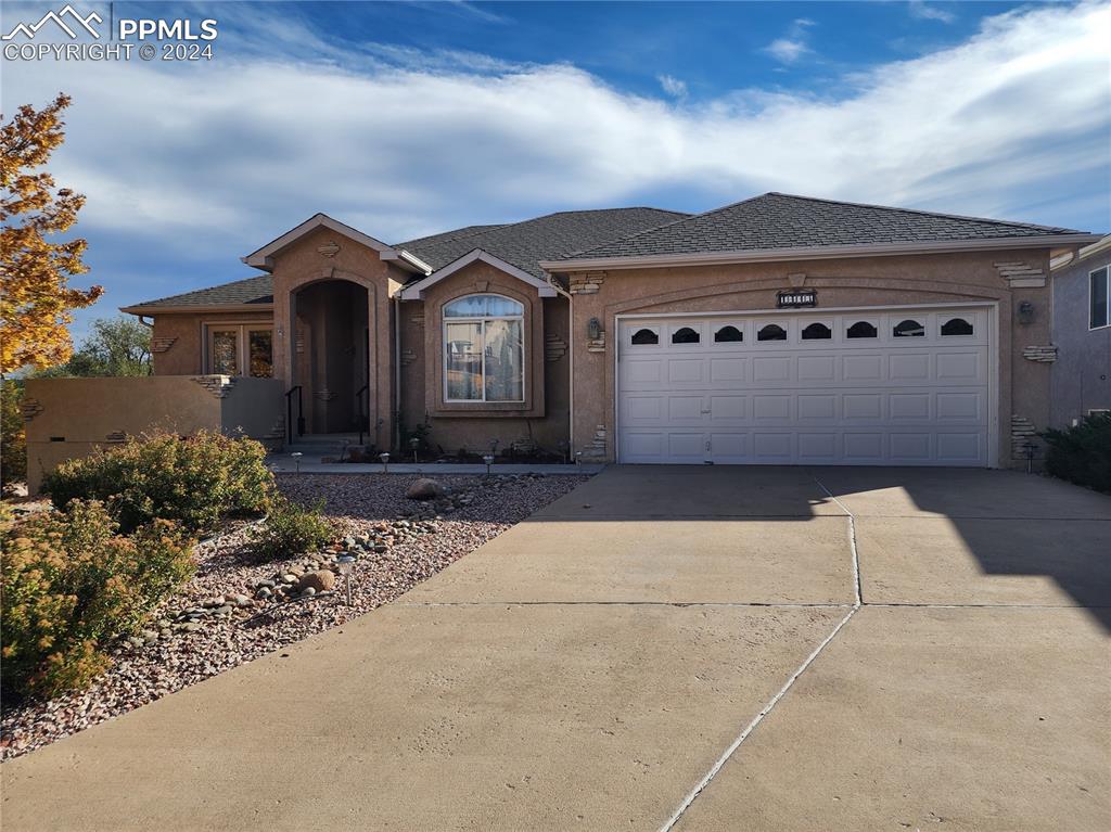 Single story home with a garage