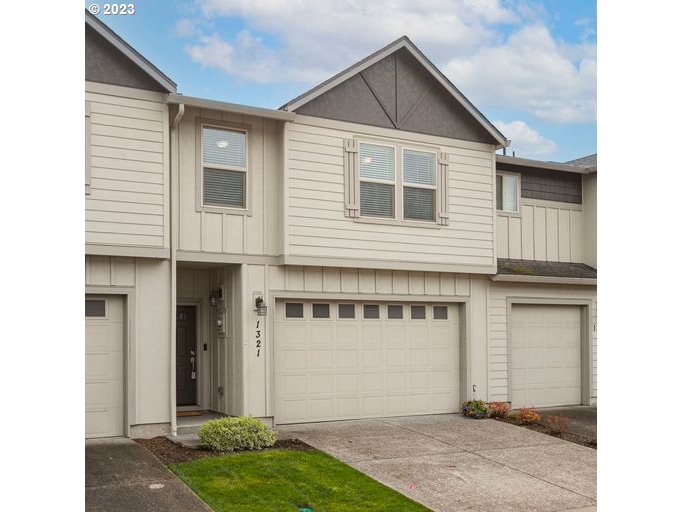 a view of a house with garage