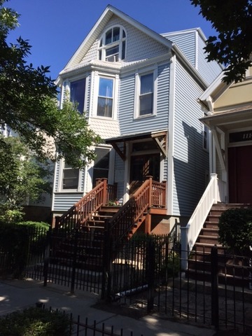 a front view of house with street