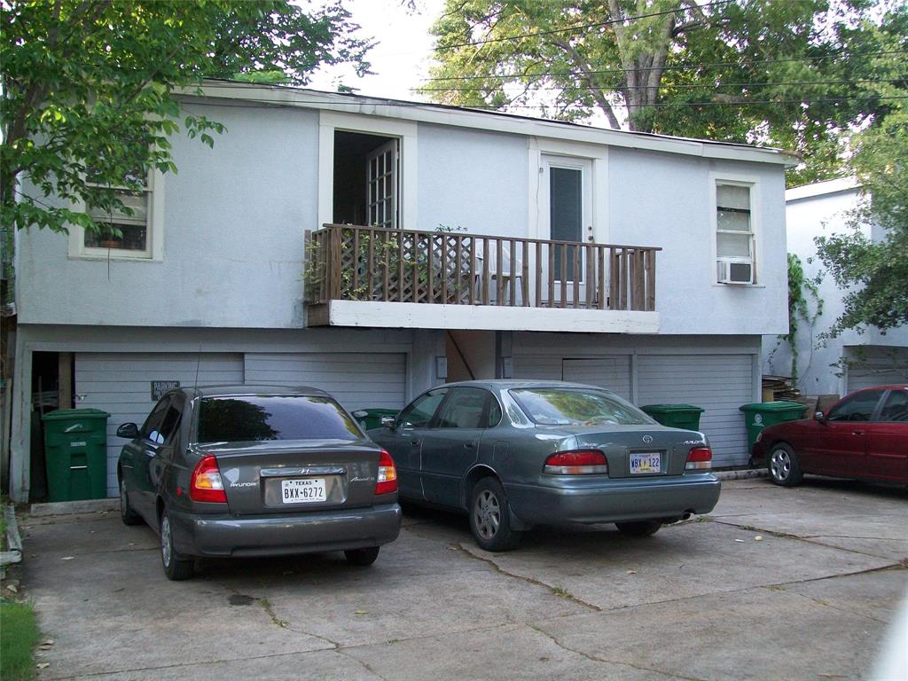 a car parked in front of a house