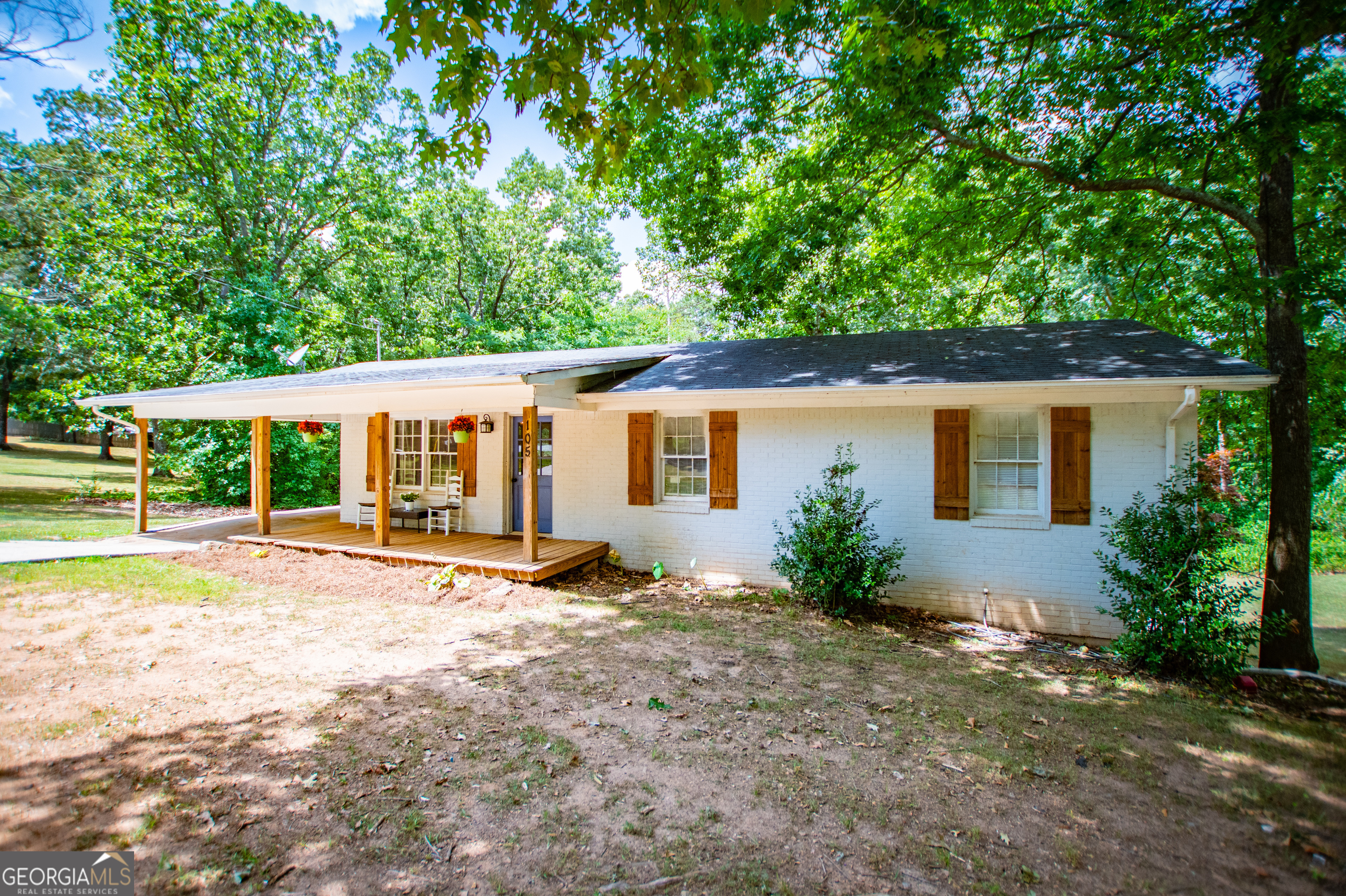 front view of a house with a big yard