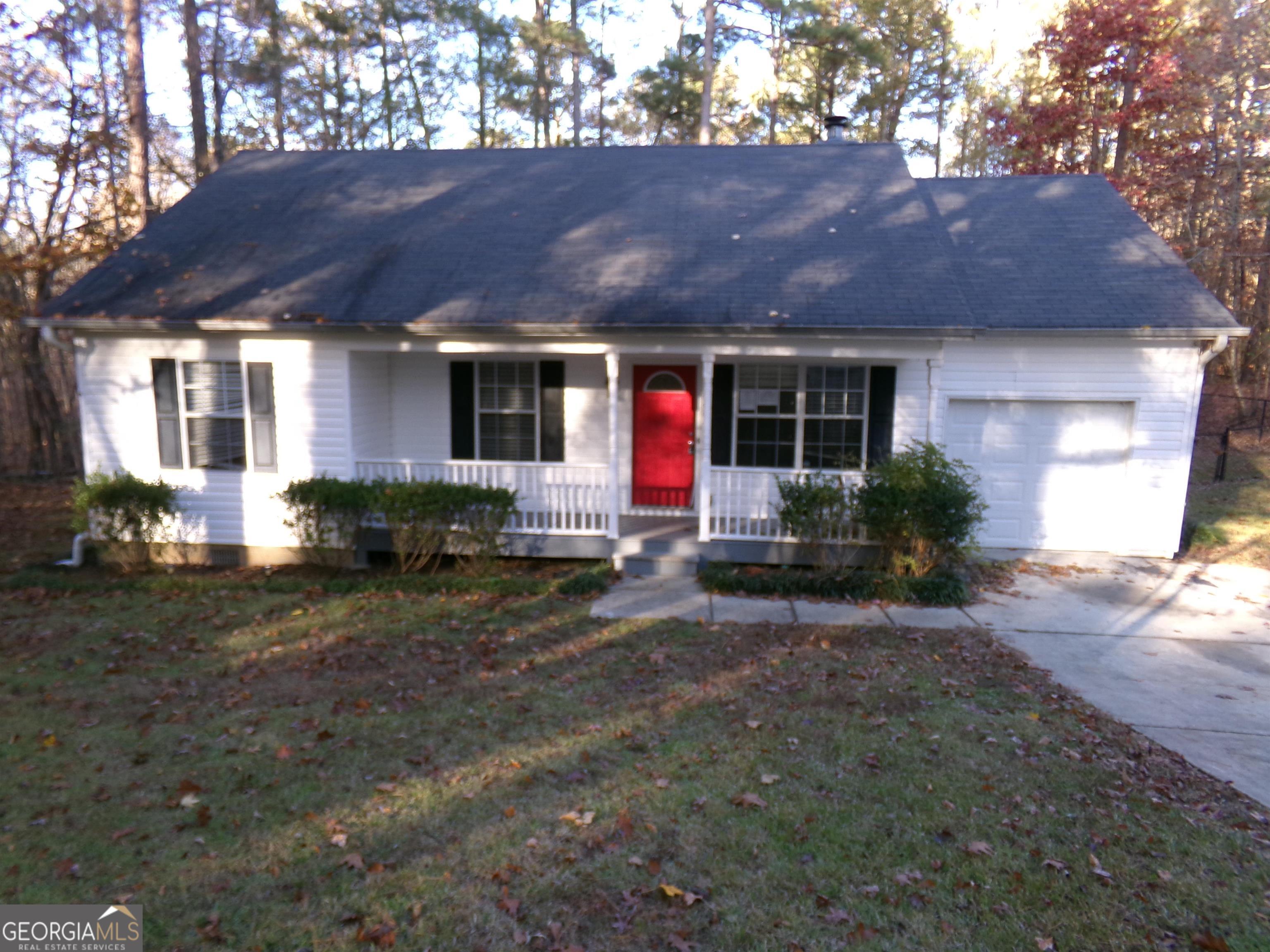 a view of house with outdoor space