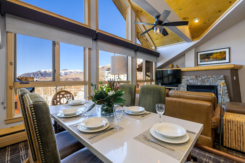 a view of a dining room with furniture window and outside view