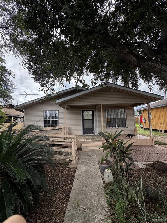 a front view of a house with yard