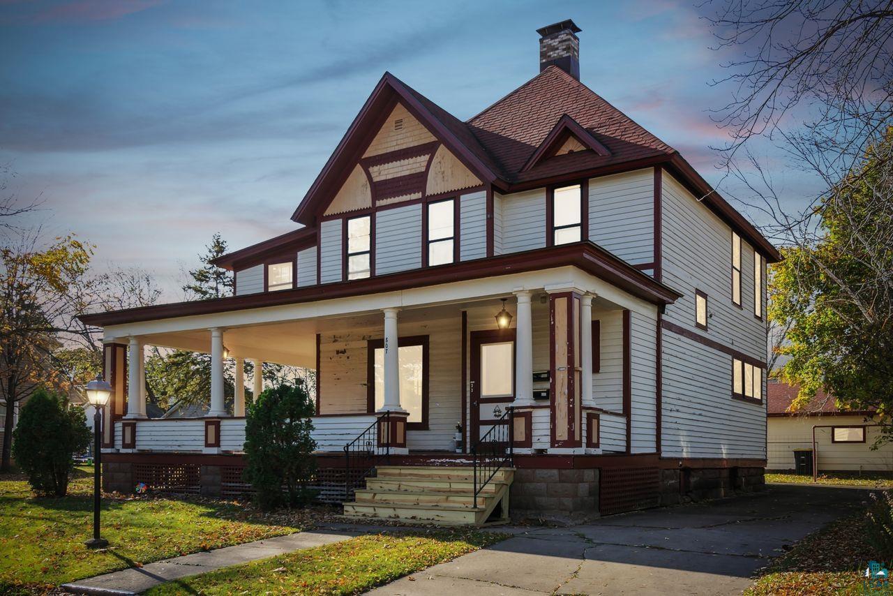 View of front of property featuring covered porch