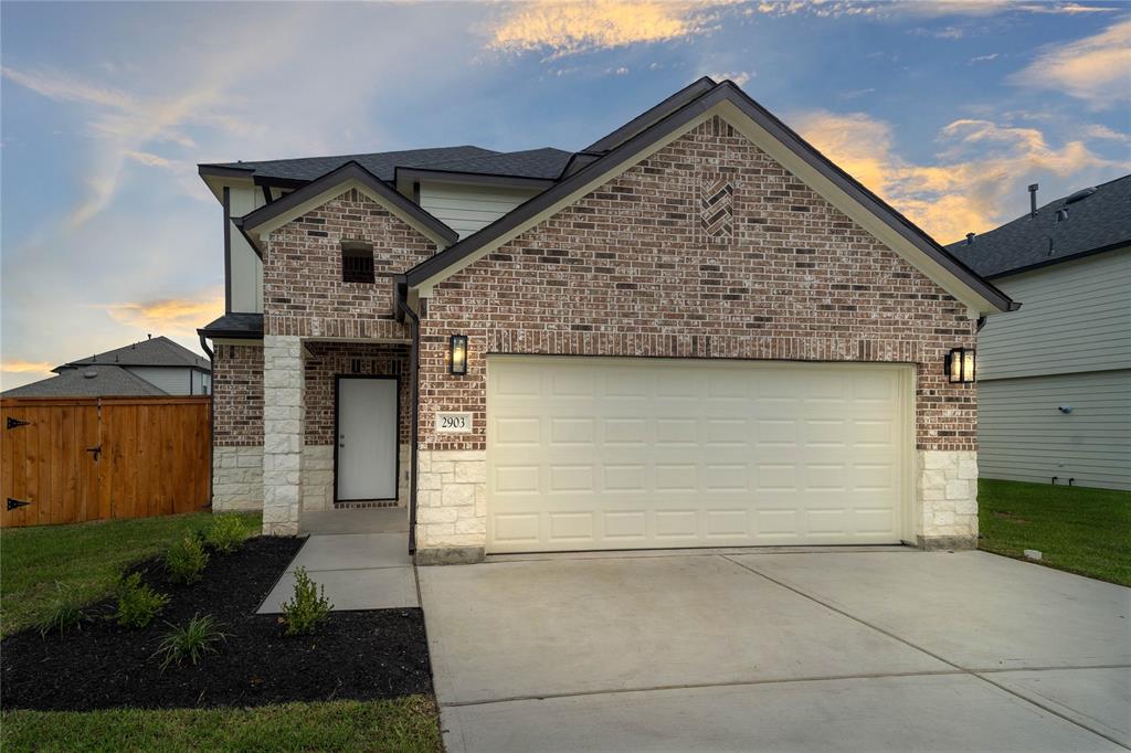 a view of a house with garage