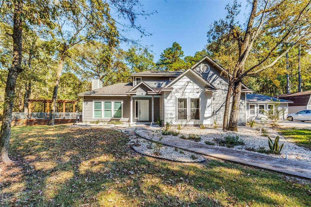 1518 Honea Egypt is country living with all the access of growing Magnolia and 1 hour from Downtown Houston with tons of classic, timeless curb appeal.