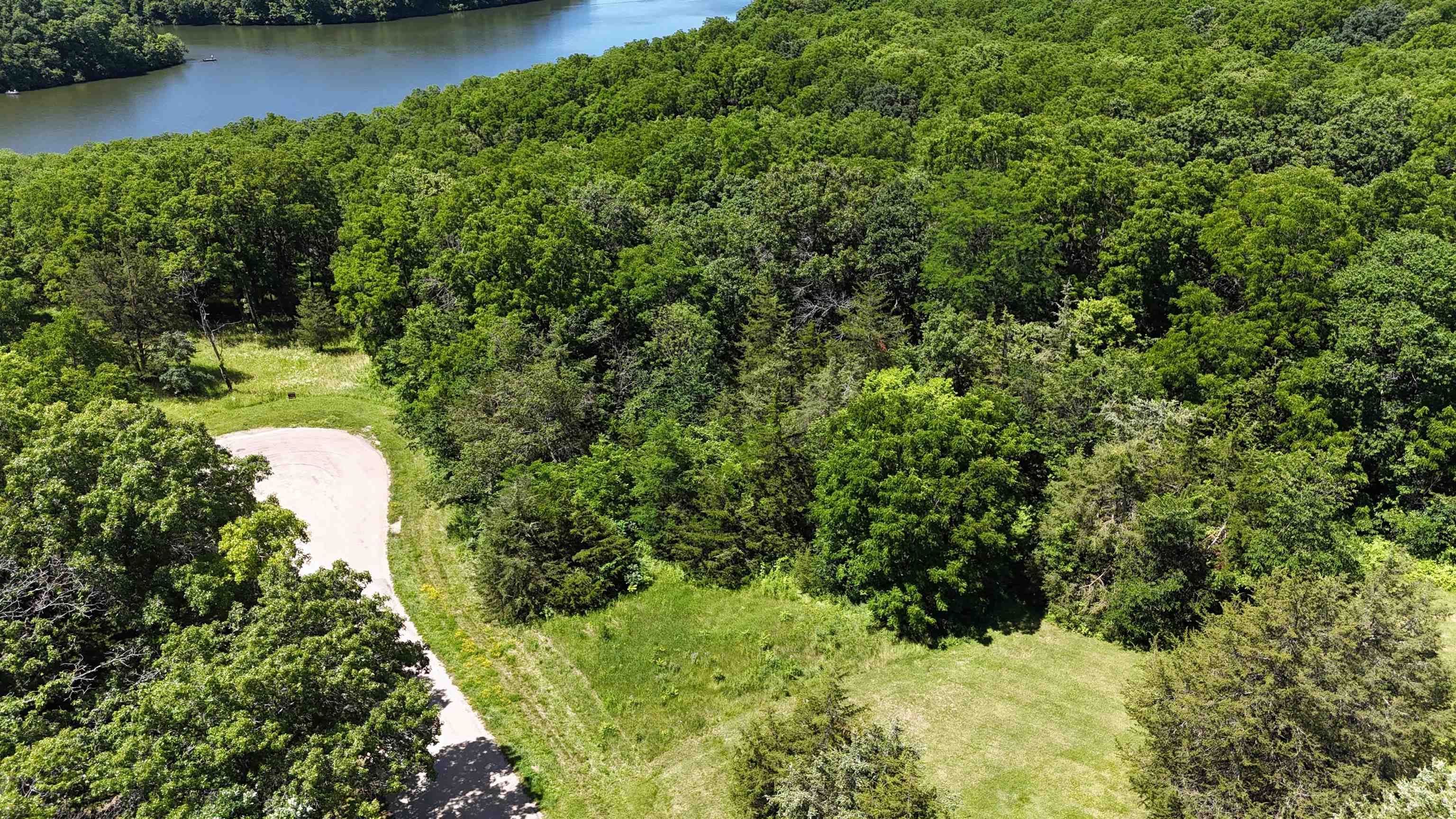 a view of a lake with a house