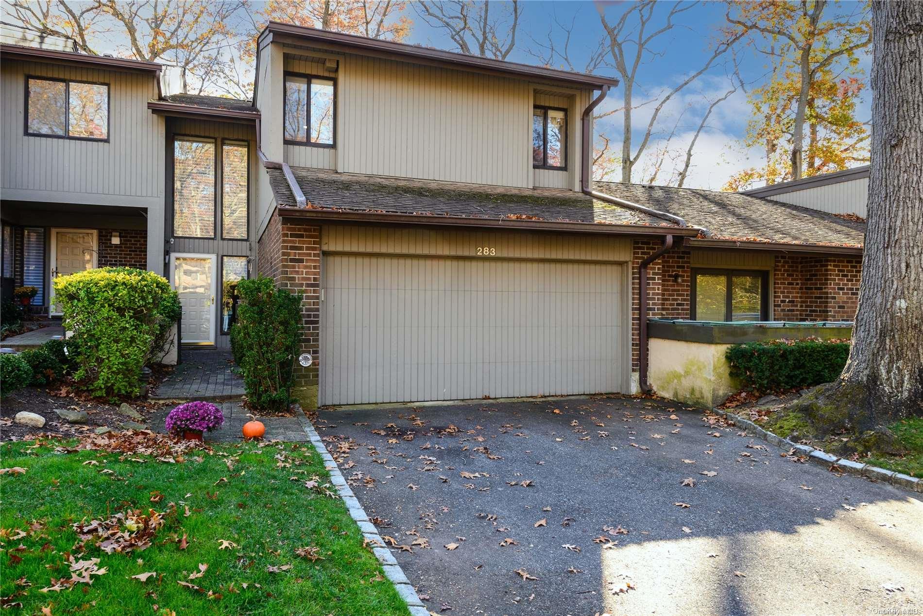 a front view of house with yard