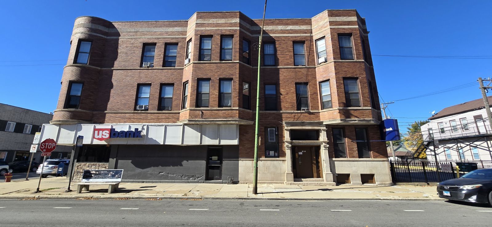 a front view of a building with street