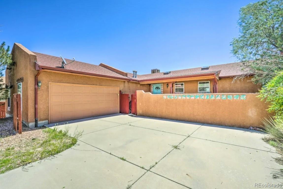 a view of front of house with garage