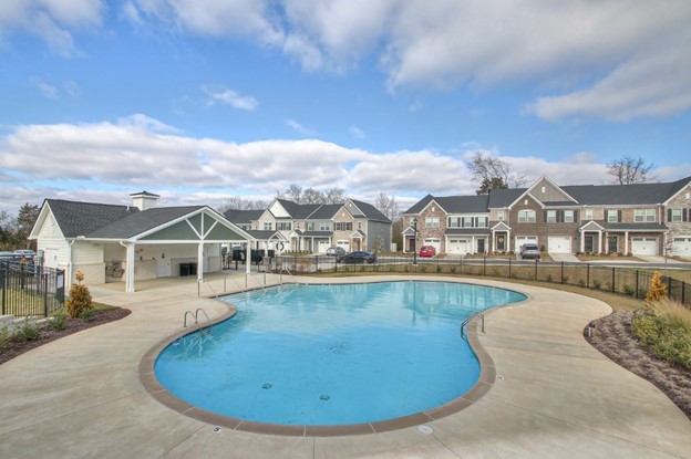 a view of a house with a swimming pool