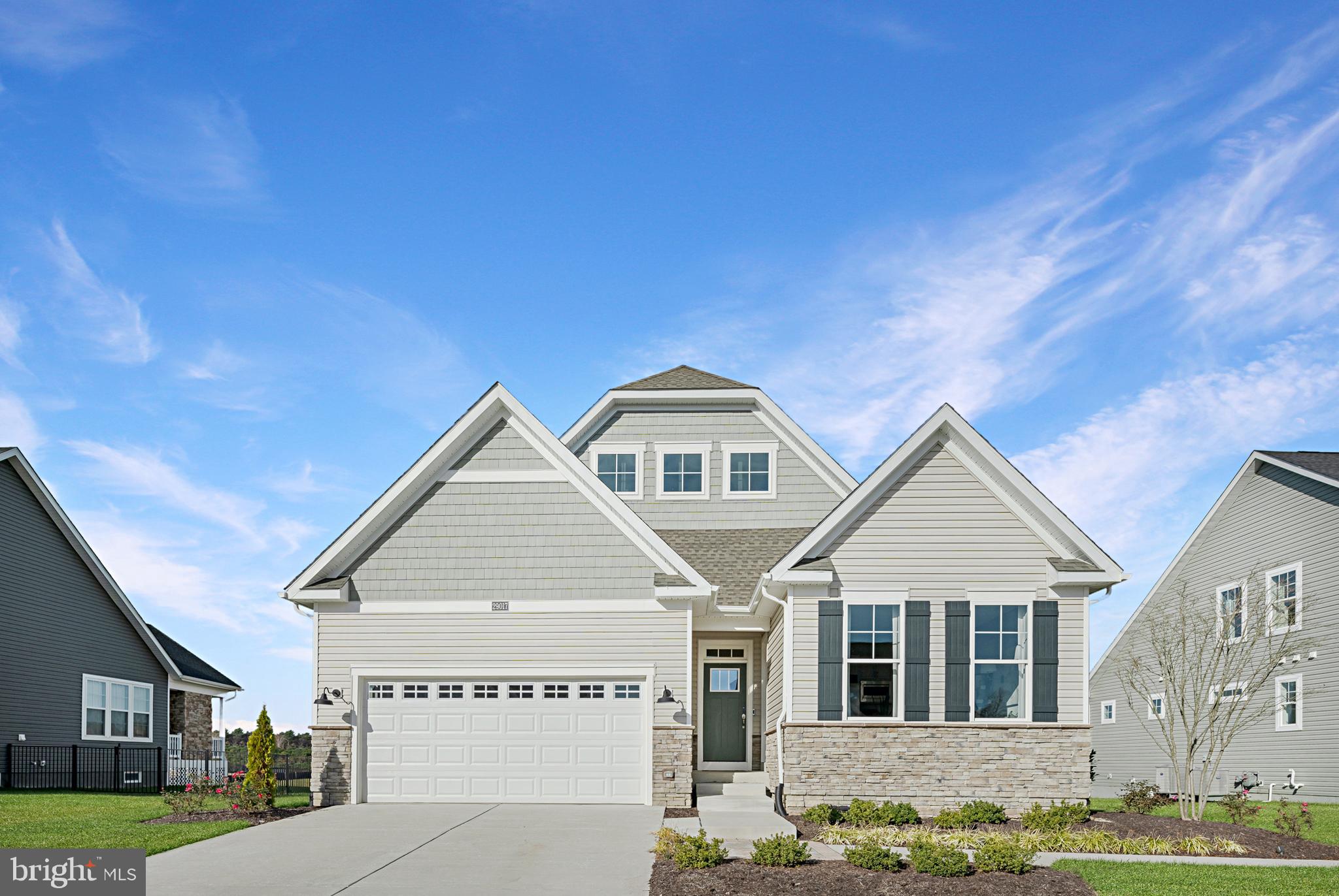 a view of house with yard