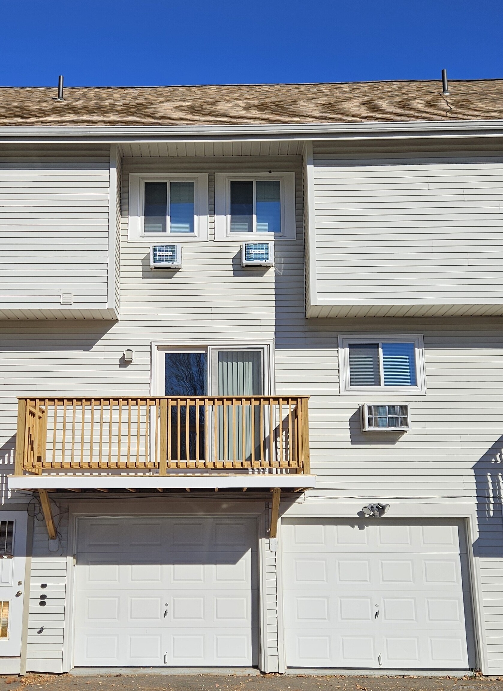 a front view of a house with balcony