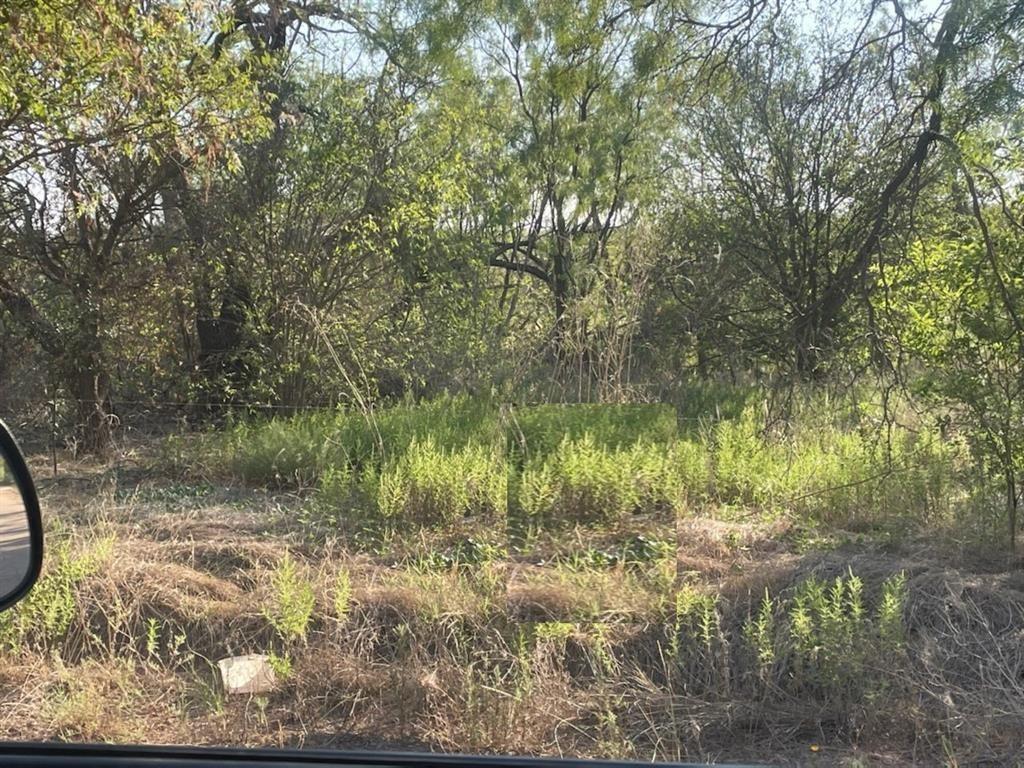 a view of lake with a yard