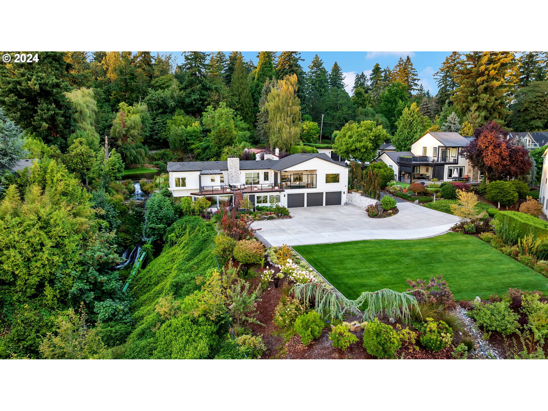 a view of a house with a backyard porch and sitting area