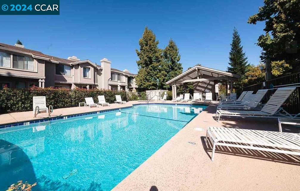 a view of a house with a swimming pool