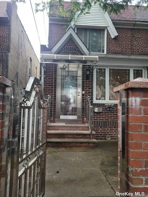 a front view of a house with a porch