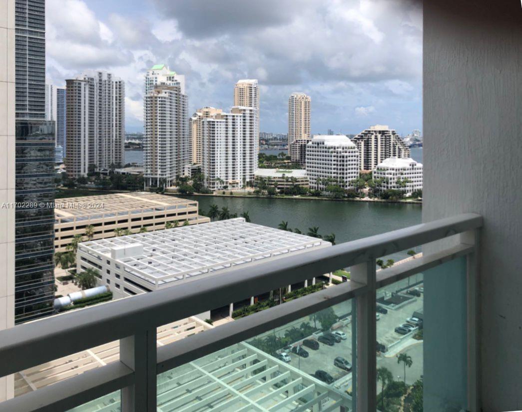 a view of a balcony with city