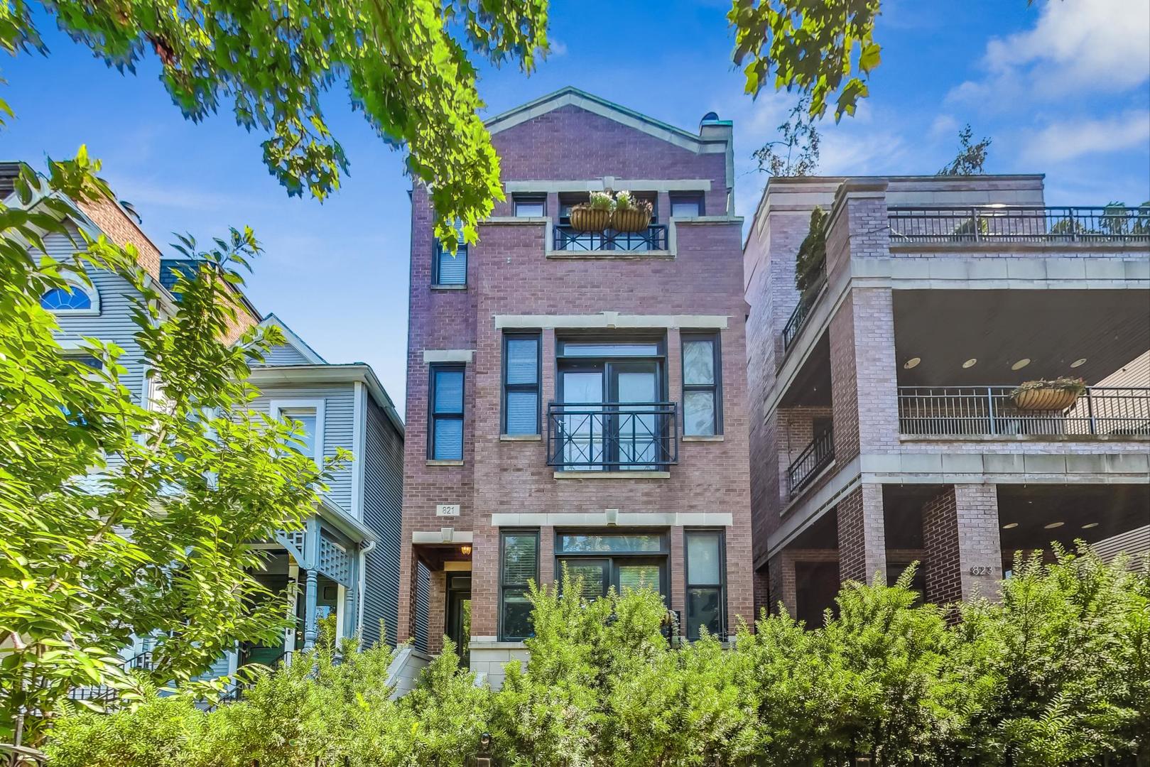 a front view of a multi story residential apartment buildings