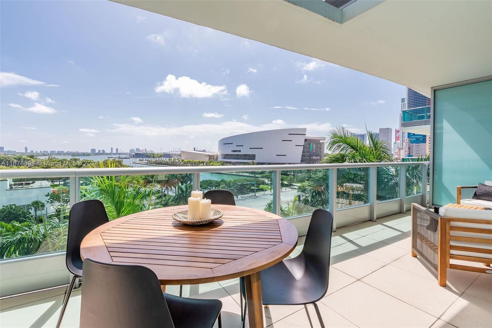 a view of a dining table and chairs in the patio