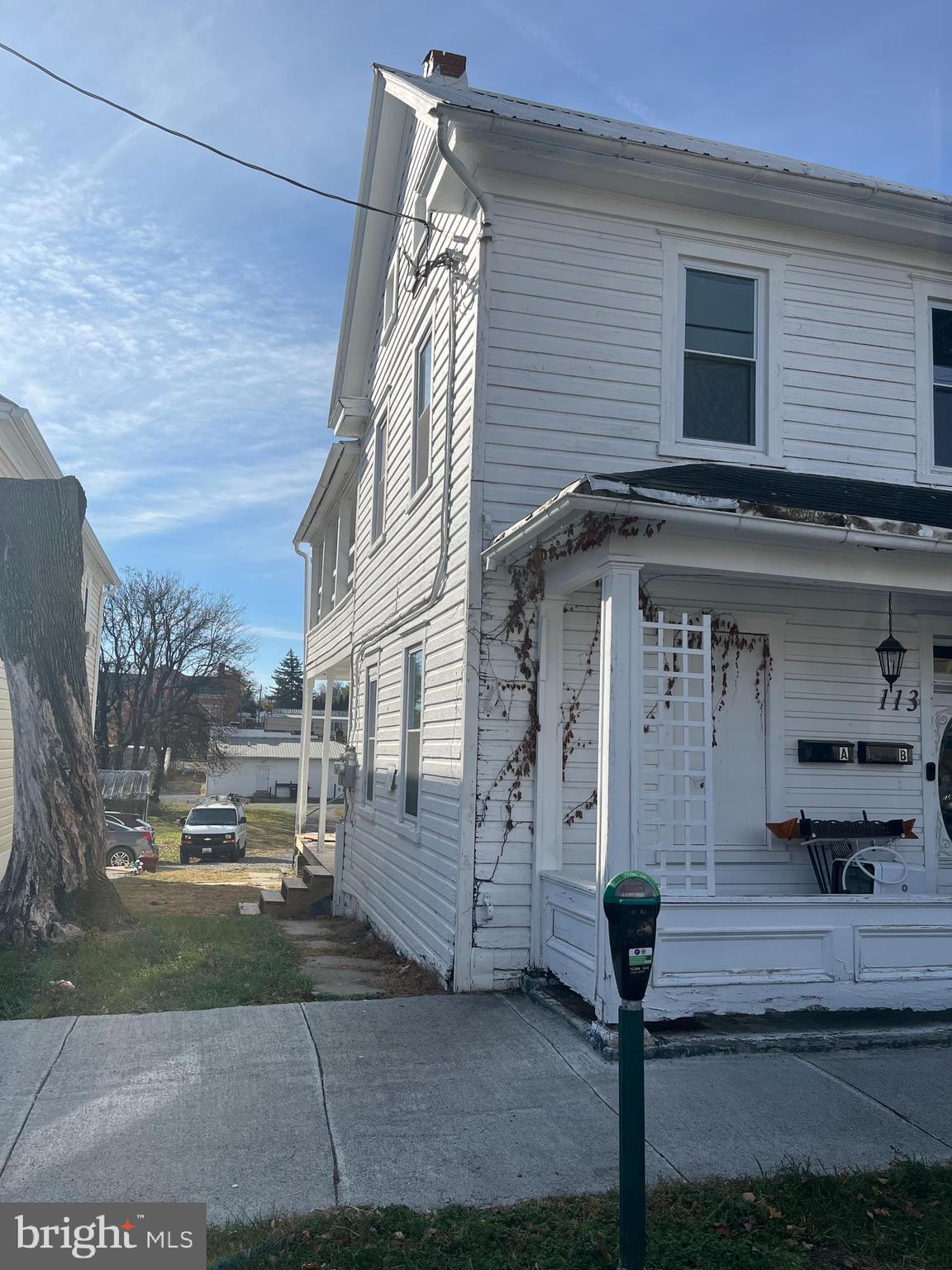 a front view of a house with garage