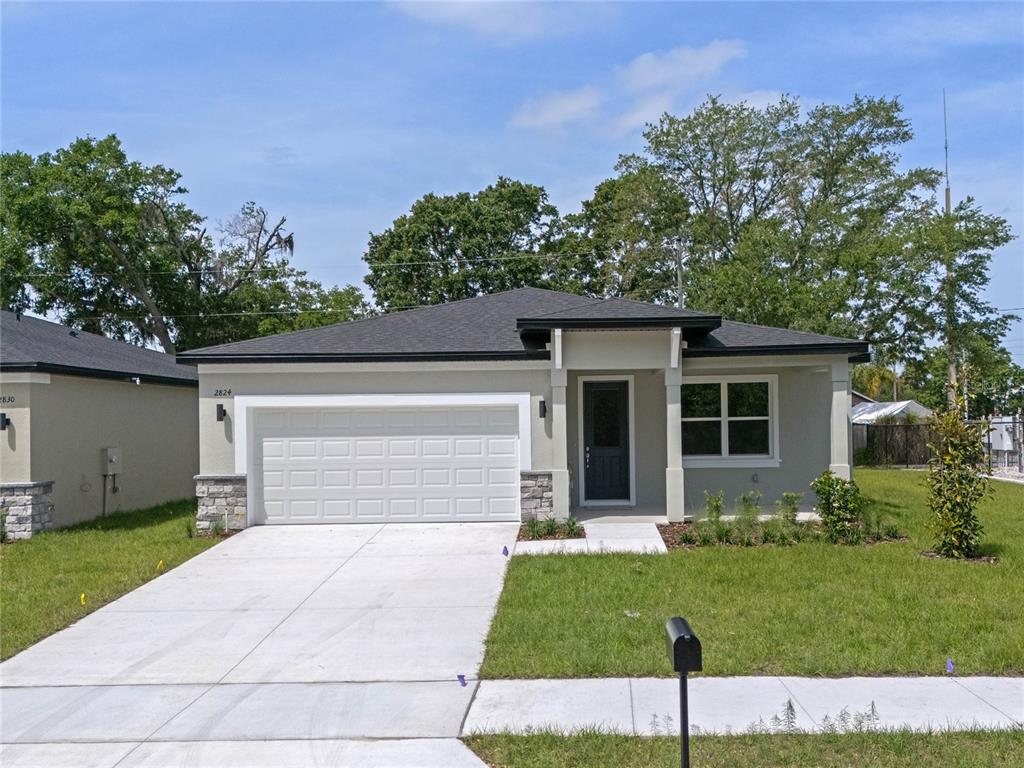 front view of a house with a yard