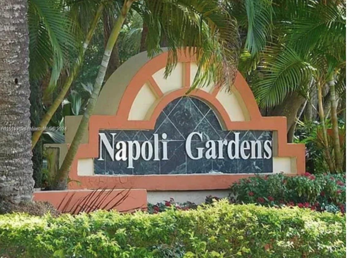 a view of outdoor space with sign board and garden