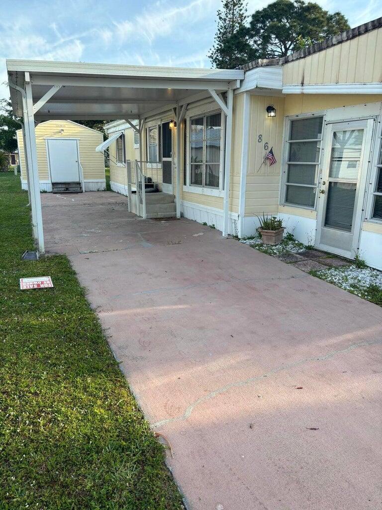 a front view of a house with a porch