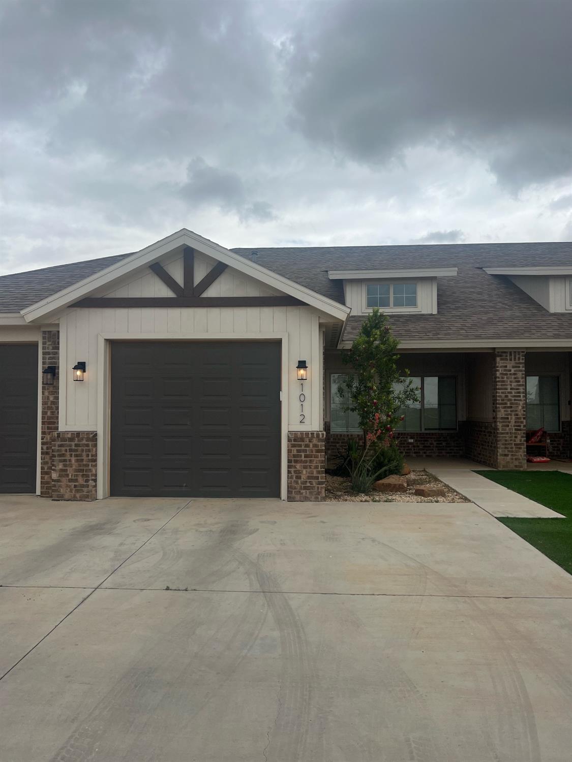 front view of a house with a garage