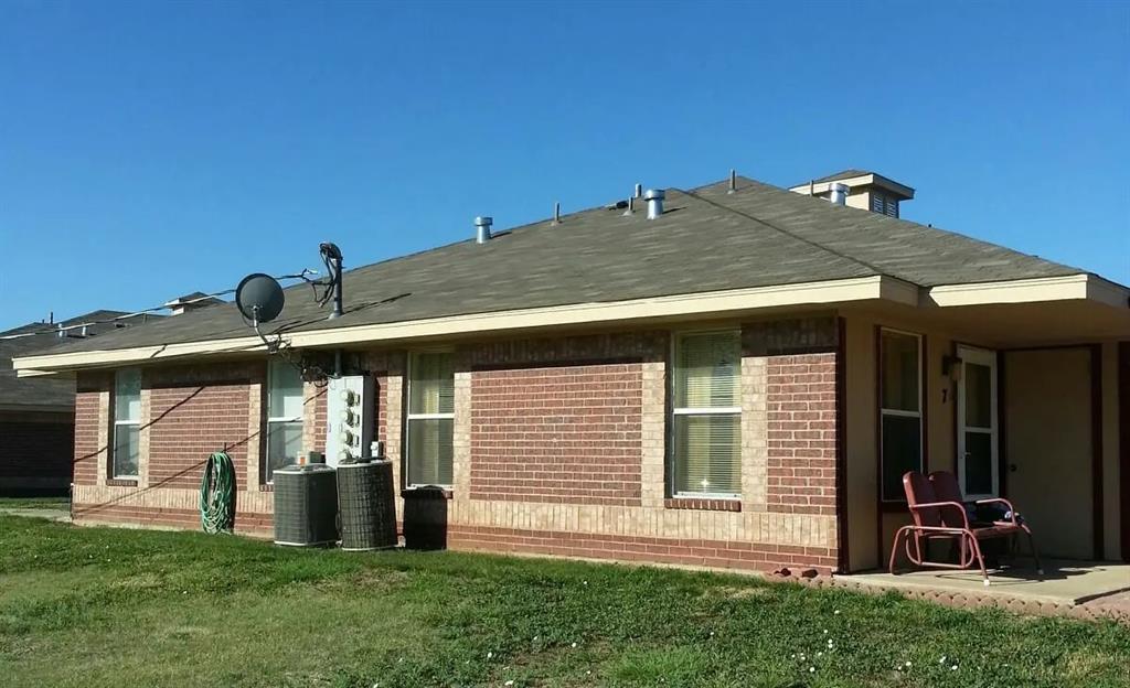 a front view of house with yard