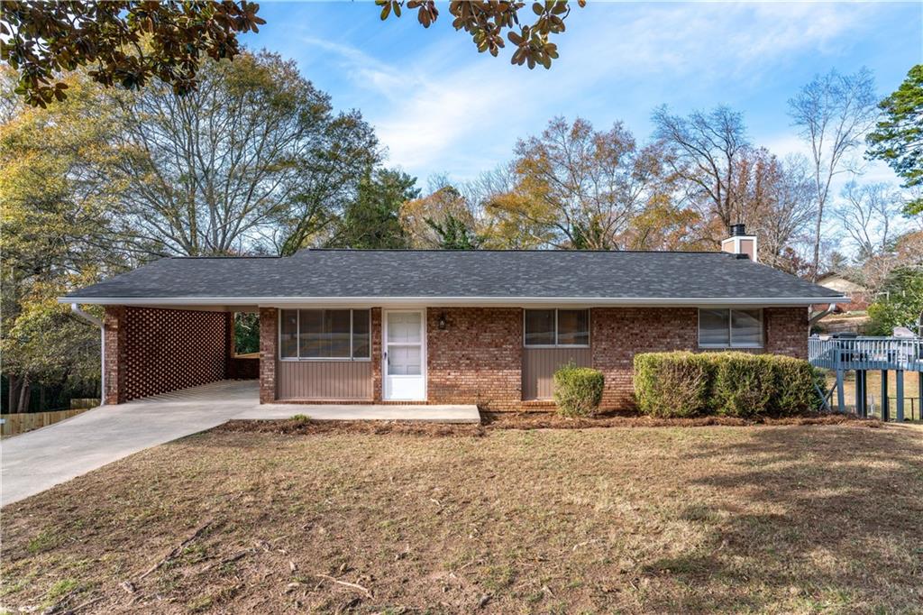 front view of a house with a yard