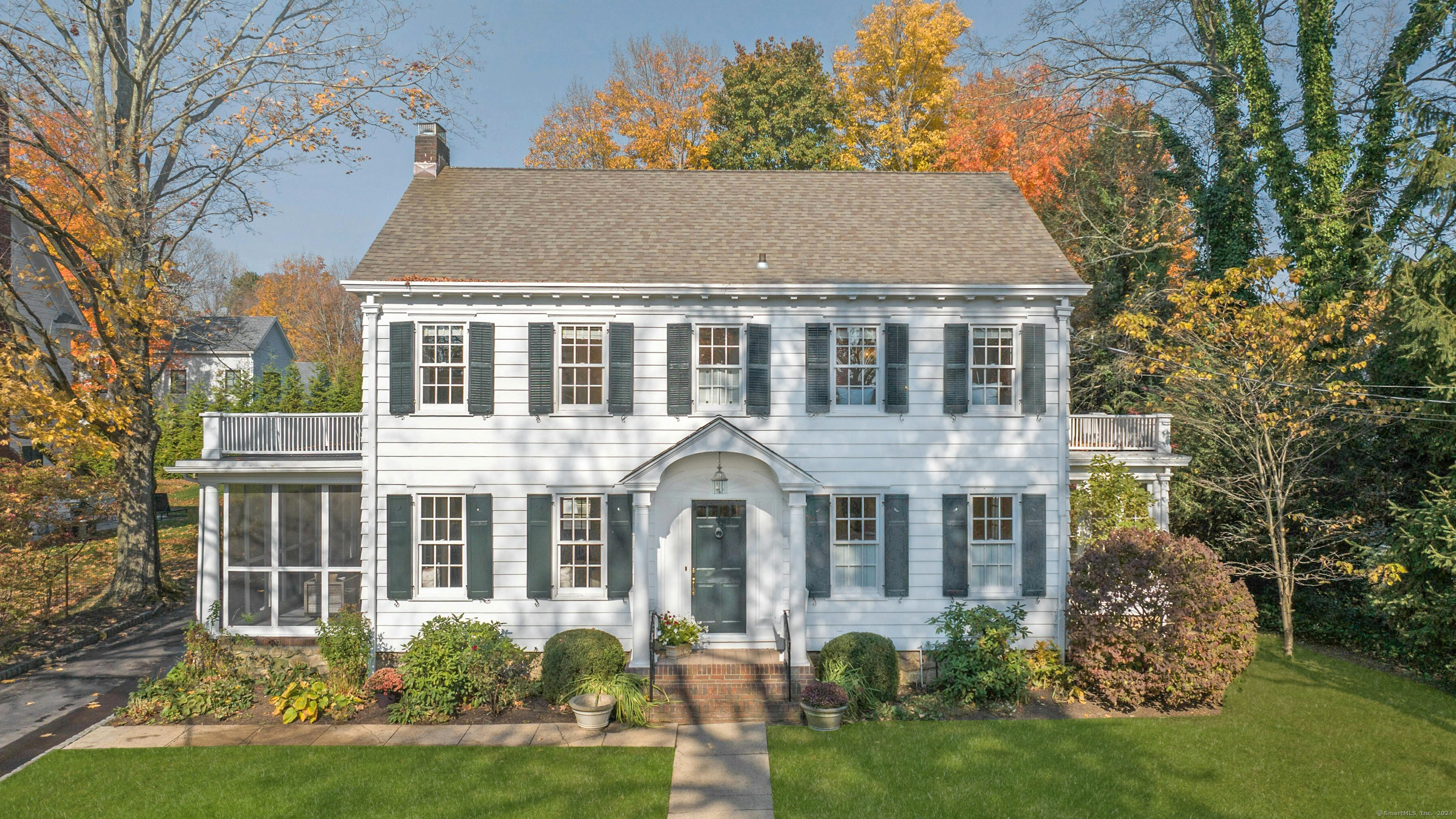 front view of a house with a yard