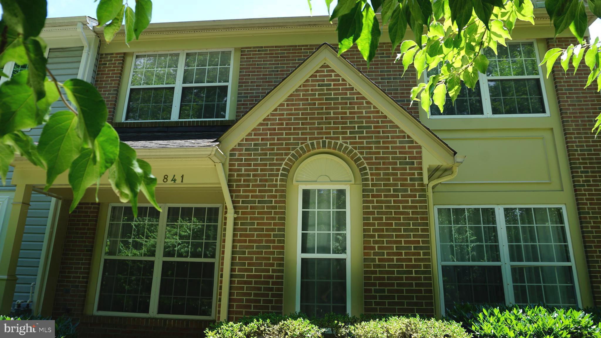 a view of a house with a window and door