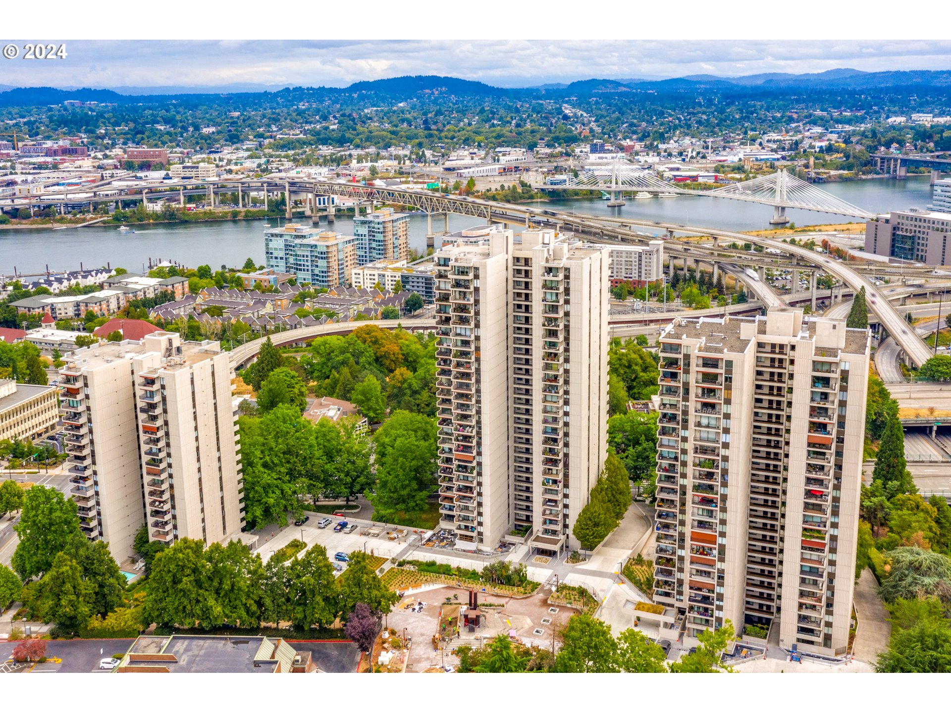 a view of a city and tall buildings