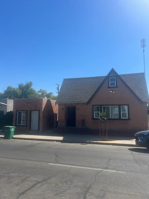 front view of a house with a street