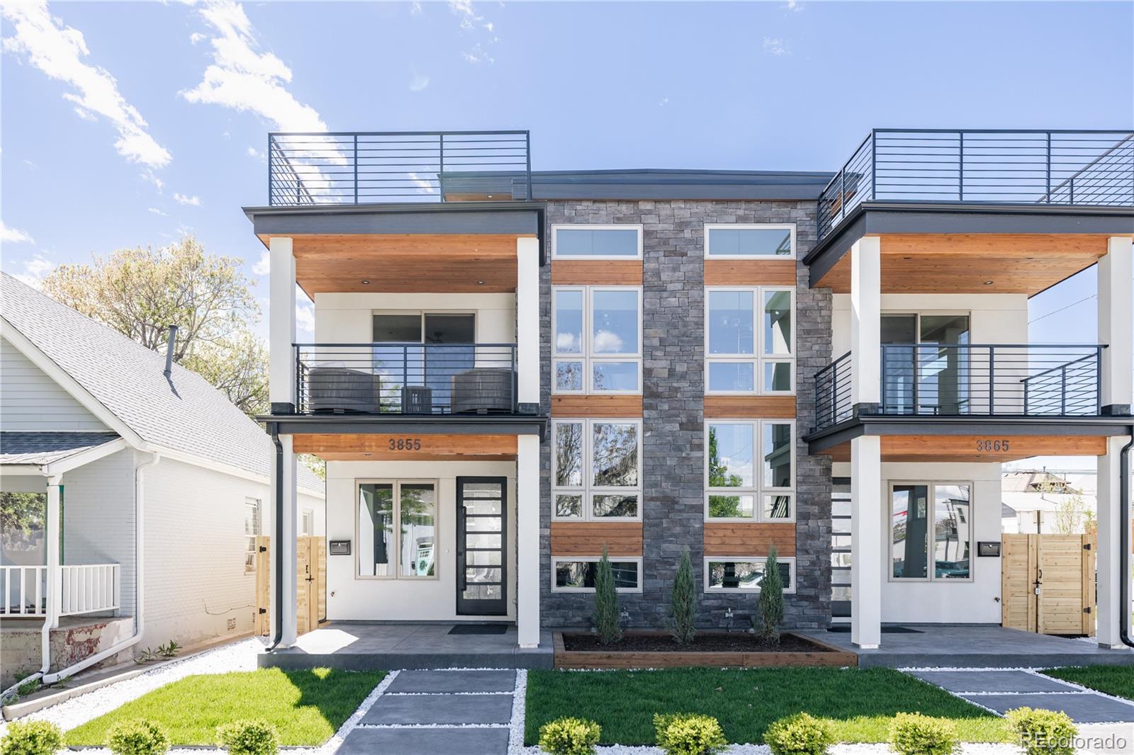 a front view of a house with swimming pool outdoor seating and yard