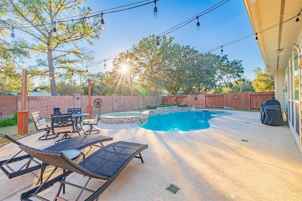 This stunning 5-bedroom home features a sparkling pool and spa perfect for entertaining!