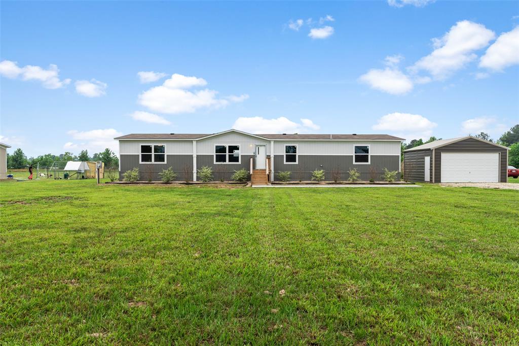 a front view of house with yard