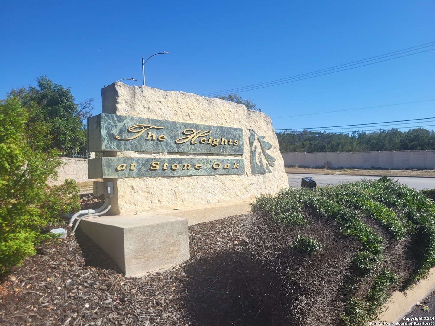 a sign on the side of the road