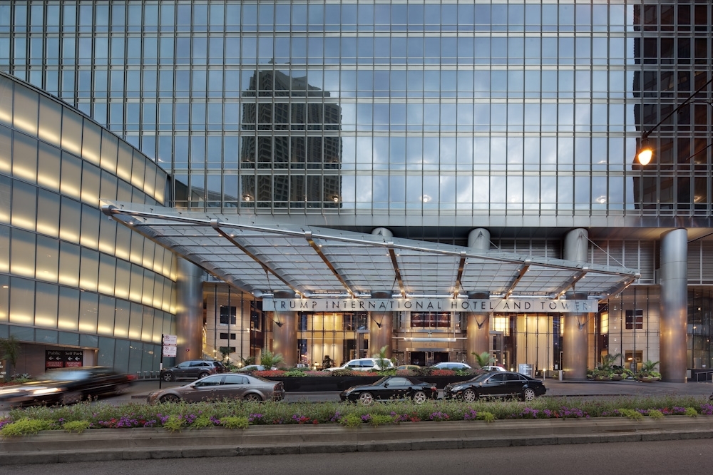 a view of a big building next to a road