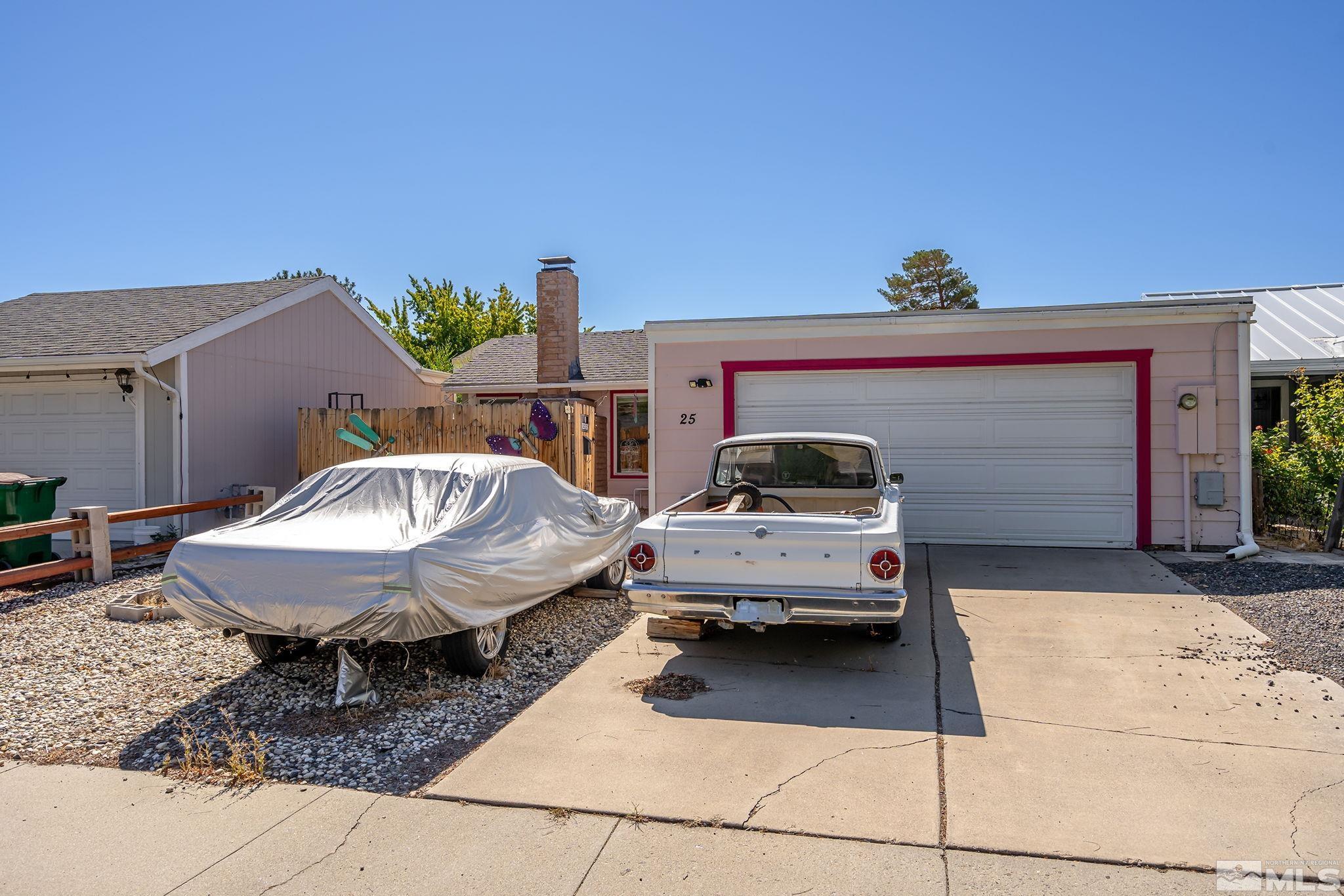 a car parked in front of a house