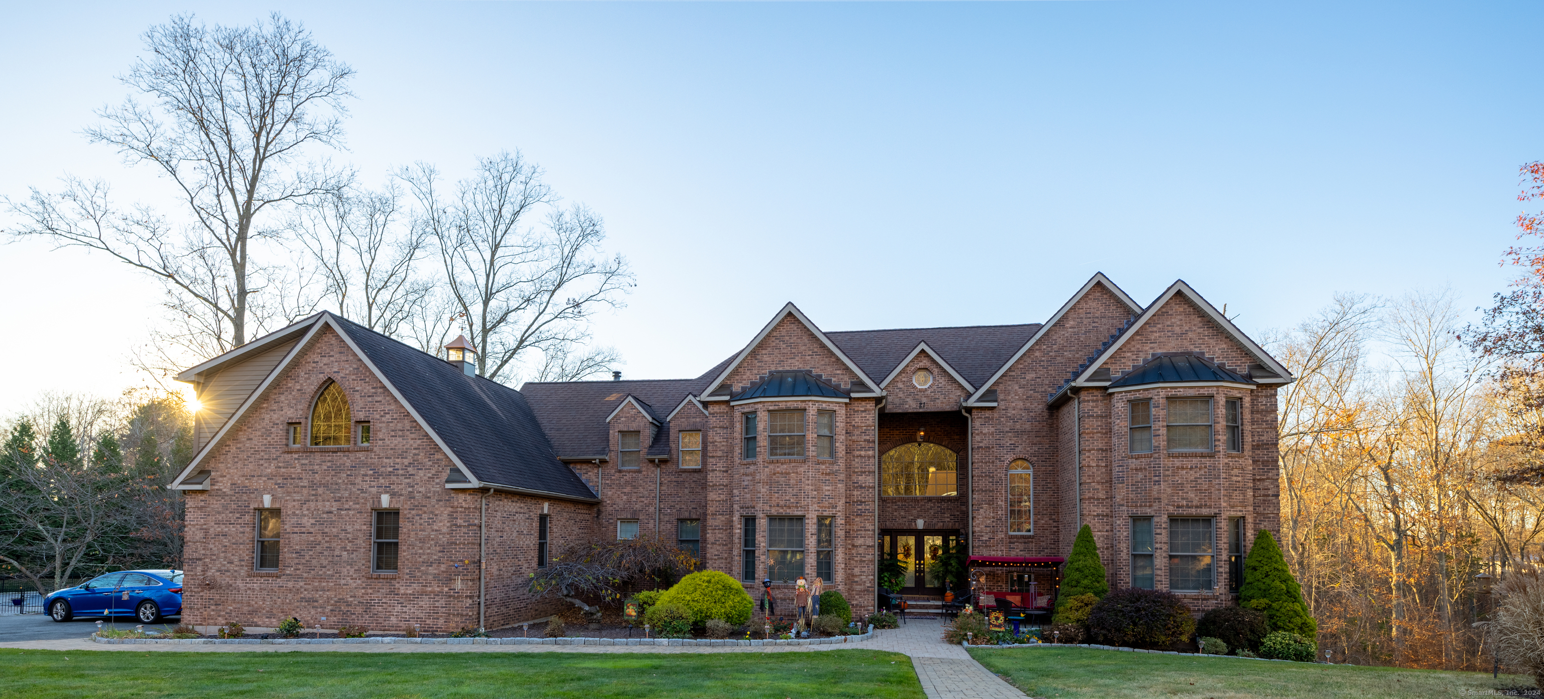 a front view of a house with garden