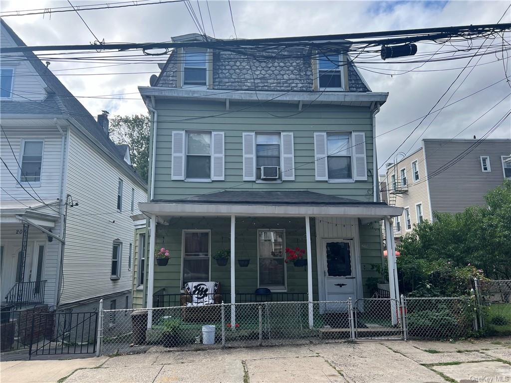 View of front of property with covered porch