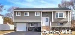 a front view of a house with a garage