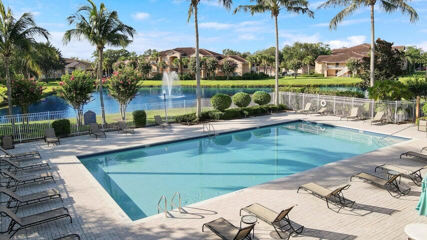 a view of a swimming pool with a patio