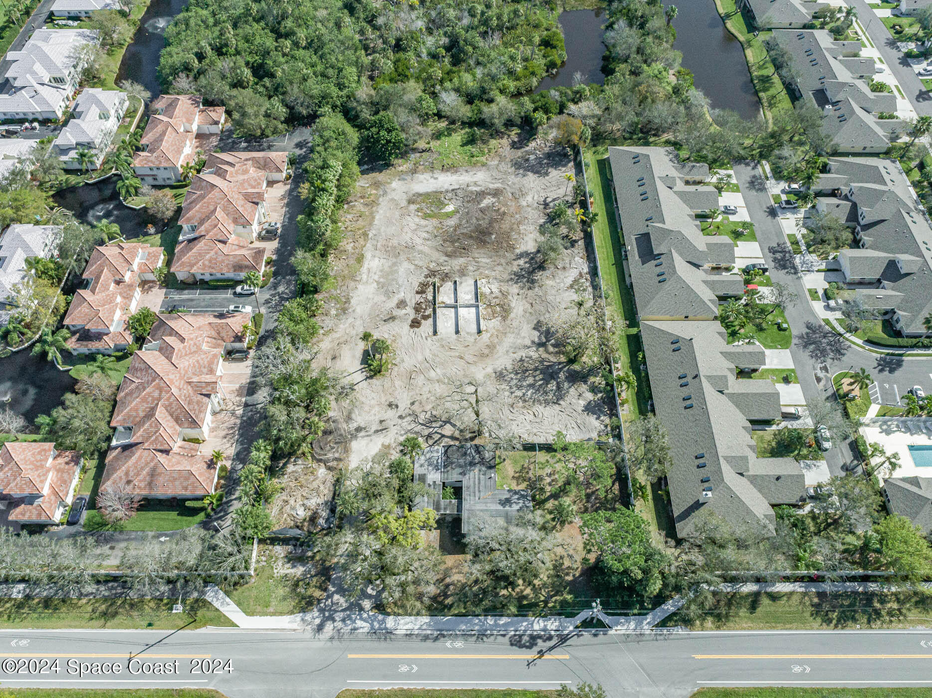 an aerial view of residential house with outdoor space