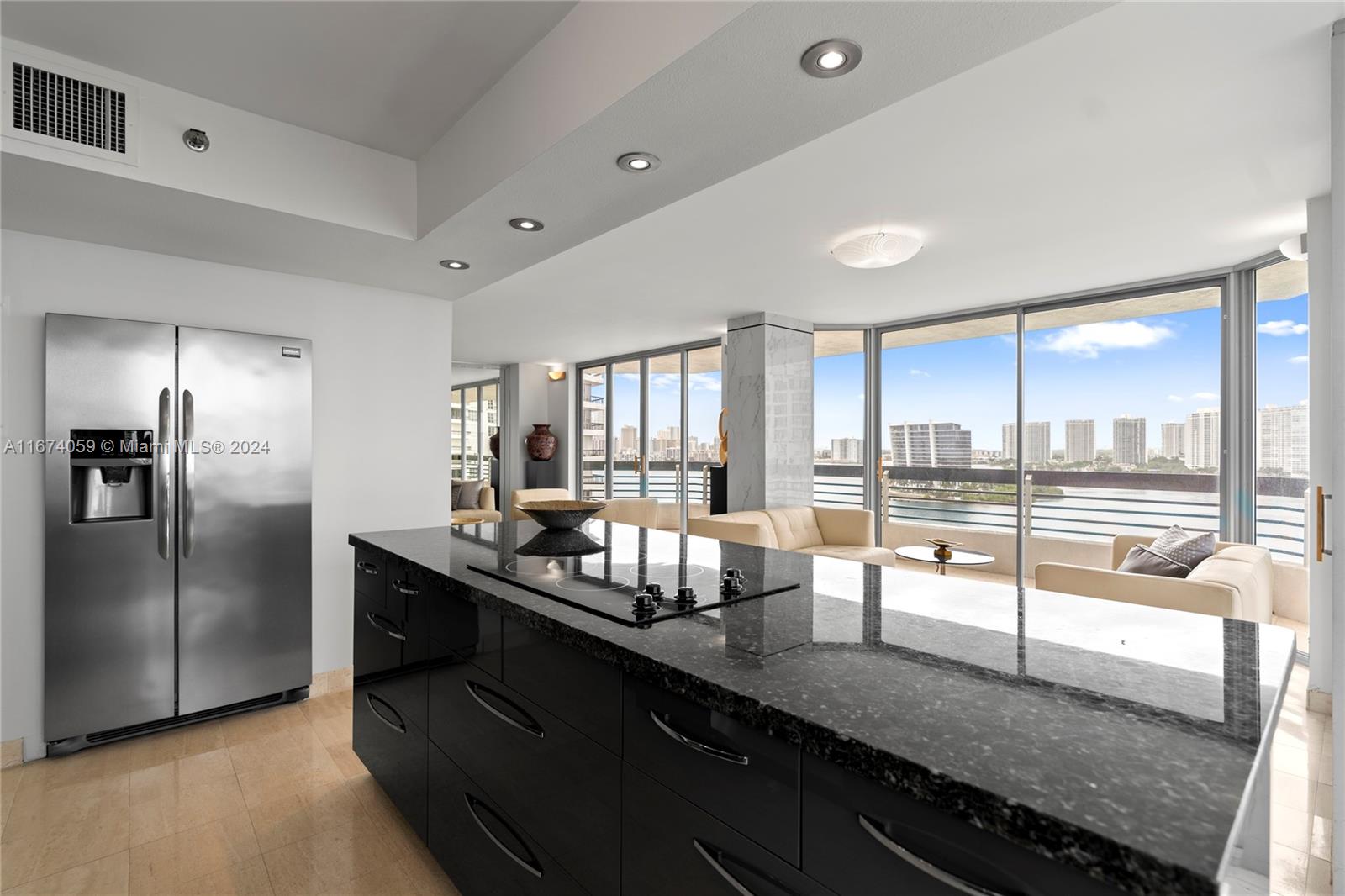 a kitchen with counter top space cabinets and stainless steel appliances