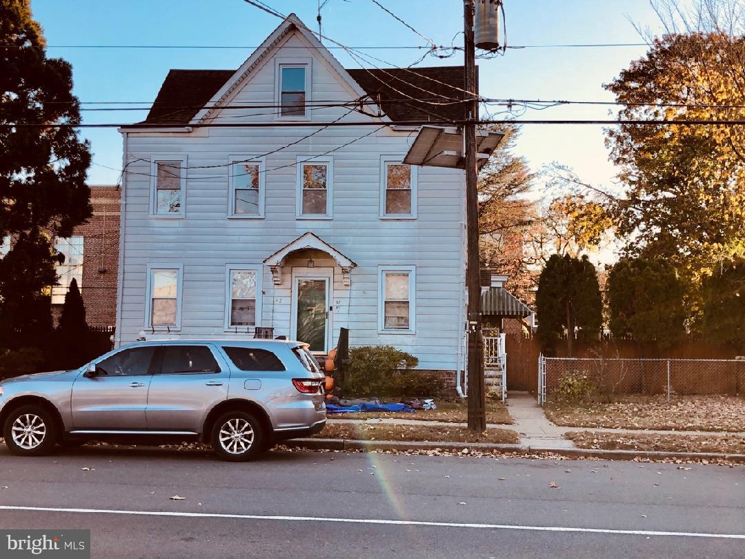 a car parked in front of a house